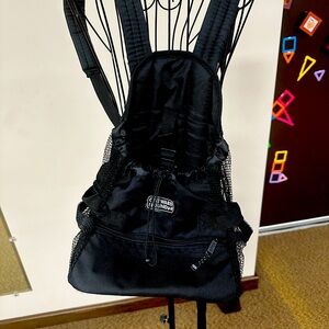 Medium size animal back pack carrier in black Outward Hound